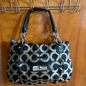 COACH: black and gray purse with front pocket